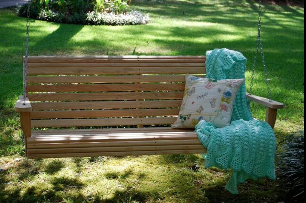 Unfinished wooden rollback porch swing