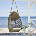 Evelyn-Outdoor-Swing-Basket-Chair-on-the Beach