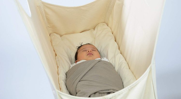 baby-is-sleeping-in-a-baby-hammock-with-stand-organic-cotton