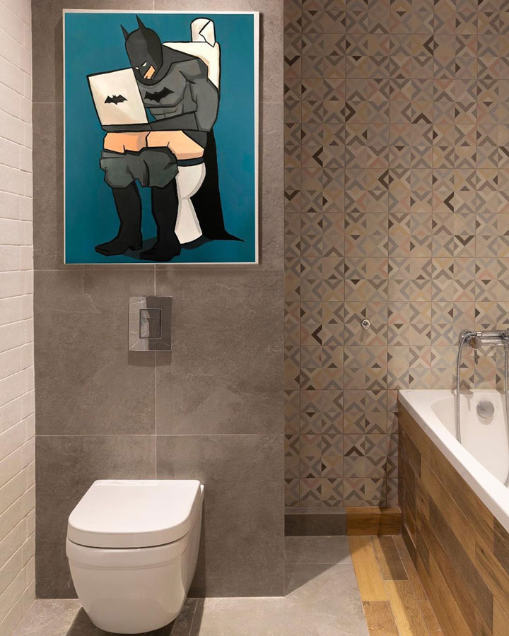 the-beathroom-with-a-silly-betman-image-hanging-on-the-wall