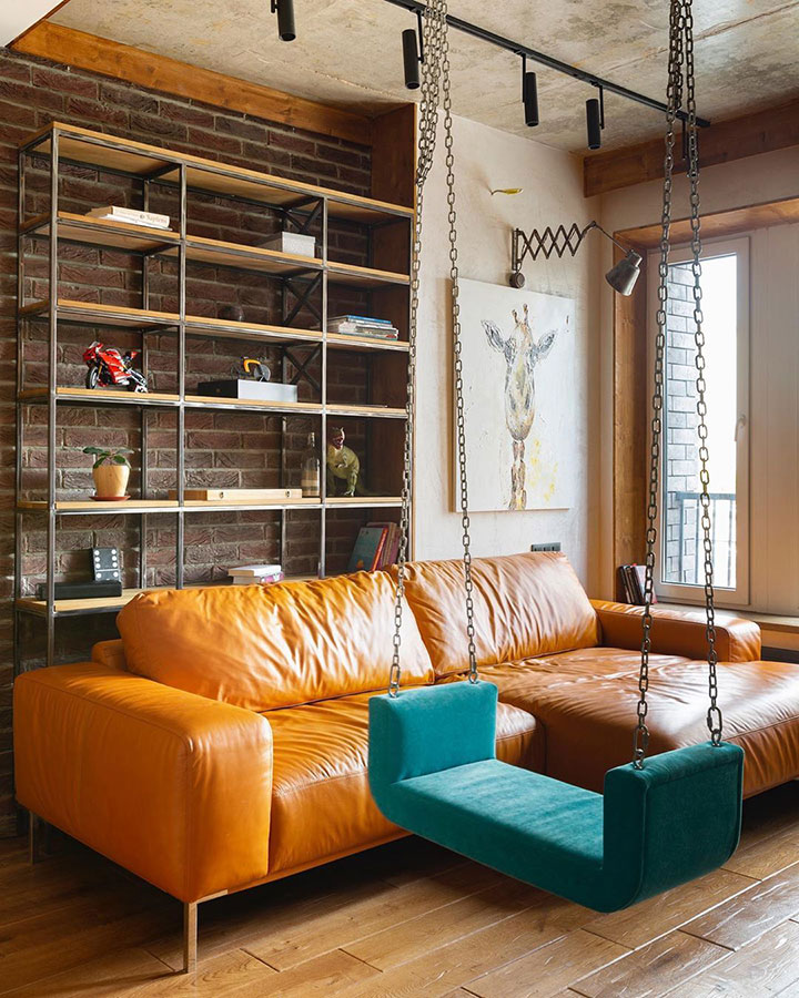 yellow-leather-sofa-and-the-bright-blue-indoor-swing-hhanging-from-ceiling